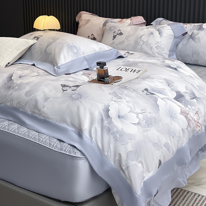 91家纺网 家纺一手货源 找家纺 2025A类母婴级天丝棉夹棉床盖床笠四件套全棉纯棉纯色长绒棉真丝保护罩高级感印花床上用品 蝶织梦-蓝