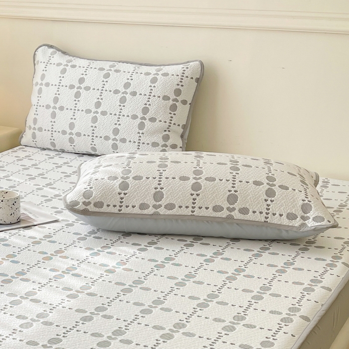 91家纺网 家纺一手货源 找家纺 LIFE.丽芙 2025春夏季新品A类针织提花冰凉豆豆凉感枕头套机包边款（风格一） 维塔-灰
