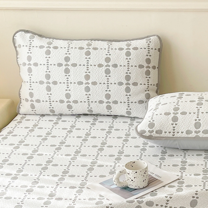 91家纺网 家纺一手货源 找家纺 LIFE.丽芙 2025春夏季新品A类针织提花冰凉豆豆凉感枕头套机包边款（风格一） 维塔-灰
