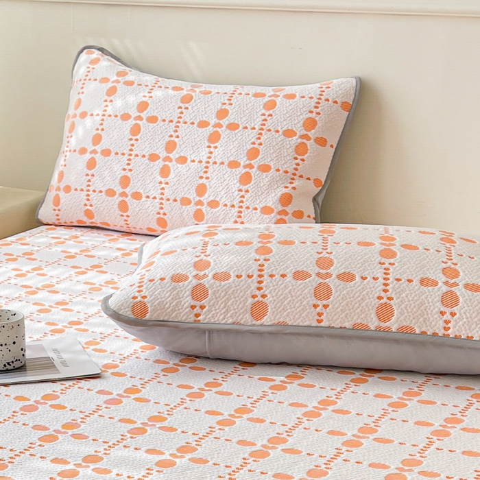 91家纺网 家纺一手货源 找家纺 LIFE.丽芙 2025春夏季新品A类针织提花冰凉豆豆凉感枕头套机包边款（风格一） 维塔-橘