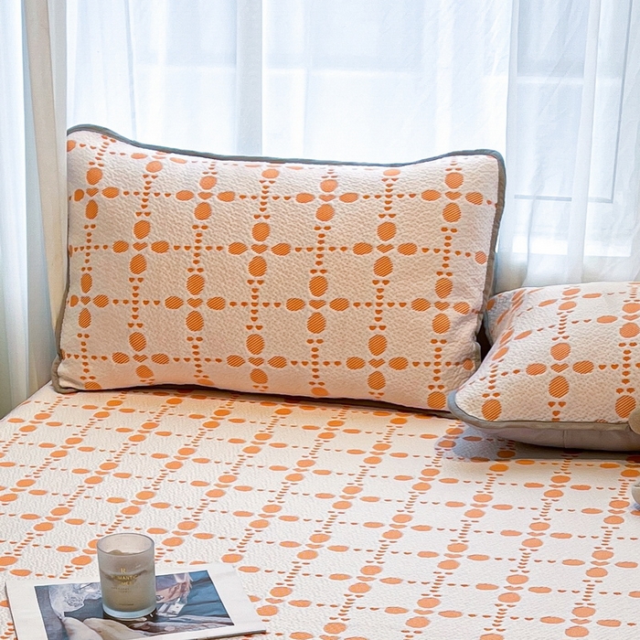 91家纺网 家纺一手货源 找家纺 LIFE.丽芙 2025春夏季新品A类针织提花冰凉豆豆凉感枕头套机包边款（风格二） 维塔-橘