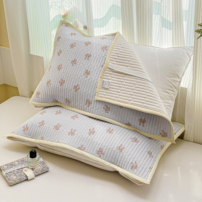 91家纺网 家纺一手货源 找家纺 雅萱家纺 2025新款全棉绗缝夹棉枕巾 格纹蝴蝶结-枕巾 50*80cm一对