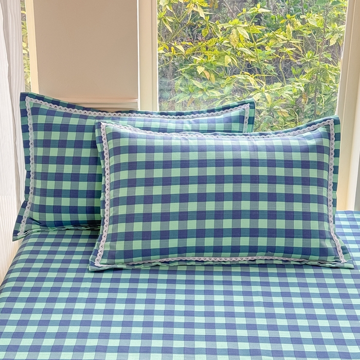 91家纺网 家纺一手货源 找家纺 宜家坊 2025新款春夏原棉鱼骨棉老粗布花边印花床单软凉席三件套 蓝格