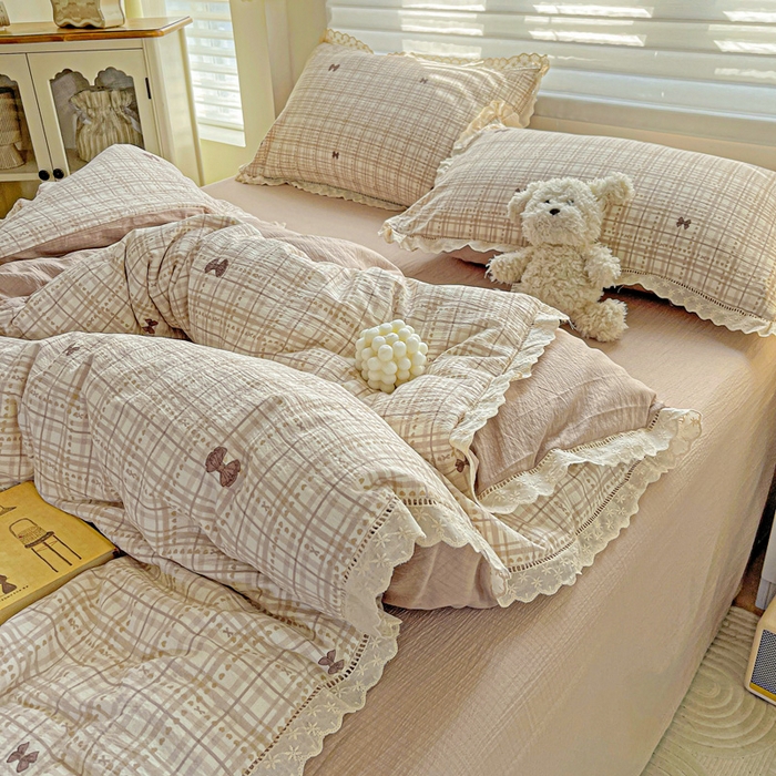 91家纺网 家纺一手货源 找家纺 金梦拉家纺 2025新款提花纱布皱皱纱四件套（全棉镂空花边款） 镂空花边-咖调蝴蝶结