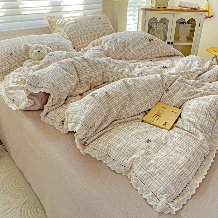 91家纺网 家纺一手货源 找家纺 金梦拉家纺 2025新款提花纱布皱皱纱四件套（全棉镂空花边款） 镂空花边-咖调蝴蝶结