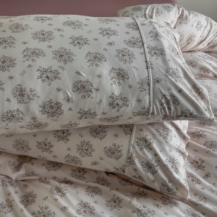 91家纺网 家纺一手货源 找家纺 梦可莱家居 2025春夏新款全棉纯棉针织棉印花四件套 粉底蝴蝶和结