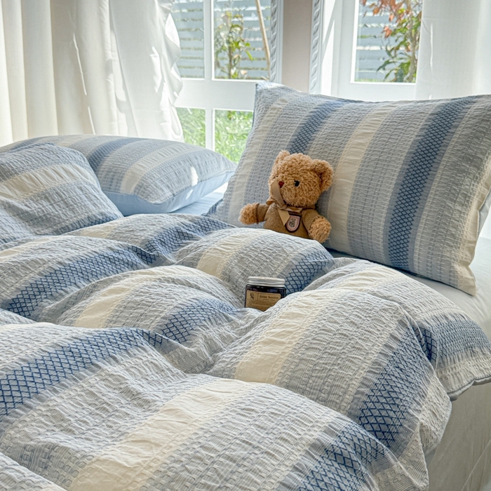 91家纺网 家纺一手货源 找家纺 米可2025春夏新款A类色织华夫格提花全棉四件套 沐言-蓝  