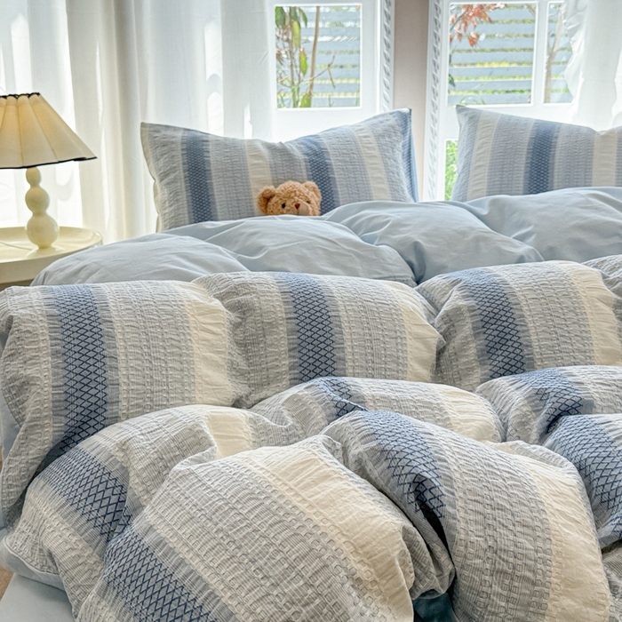 91家纺网 家纺一手货源 找家纺 米可2025春夏新款A类色织华夫格提花全棉四件套 沐言-蓝  