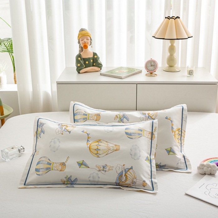 91家纺网 家纺一手货源 找家纺 萌番宝 2025春夏新款60支长绒棉全棉儿童卡通枕套工艺学生A类枕套单枕套 城堡气球