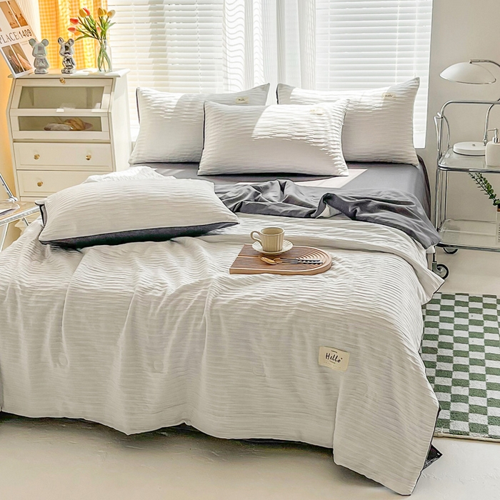 91家纺网 家纺一手货源 找家纺 斯卡诺家纺 2025新款直播爆款提花针织泡泡纱夏被四件套夏凉被空调被四件套 白灰色