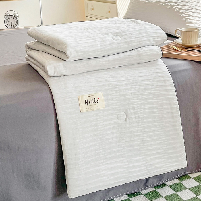 91家纺网 家纺一手货源 找家纺 斯卡诺家纺 2025新款直播爆款提花针织泡泡纱夏被四件套夏凉被空调被四件套 白灰色