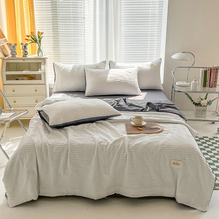 91家纺网 家纺一手货源 找家纺 斯卡诺家纺 2025新款直播爆款提花针织泡泡纱夏被四件套夏凉被空调被四件套 白灰色