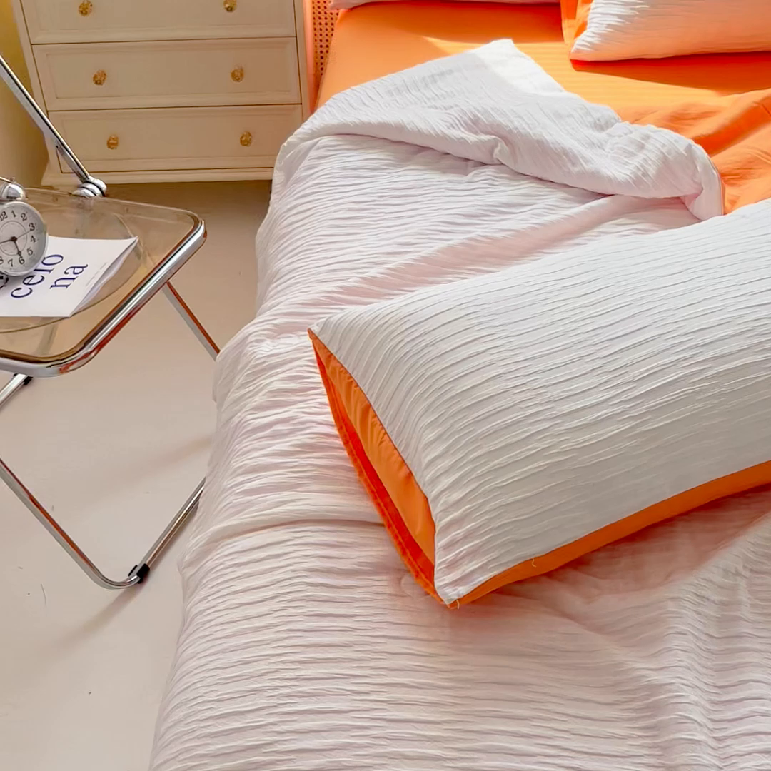 91家纺网 家纺一手货源 找家纺 斯卡诺家纺 2025新款直播爆款提花针织泡泡纱夏被四件套夏凉被空调被四件套 白桔色