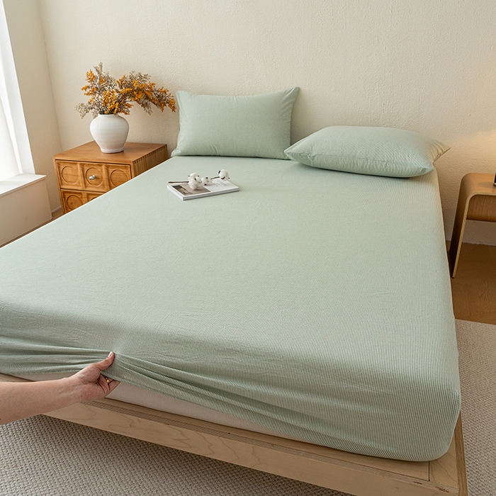 91家纺网 家纺一手货源 找家纺 吉象家纺 2025新款全棉色织水洗棉床笠三件套 秘境绿条