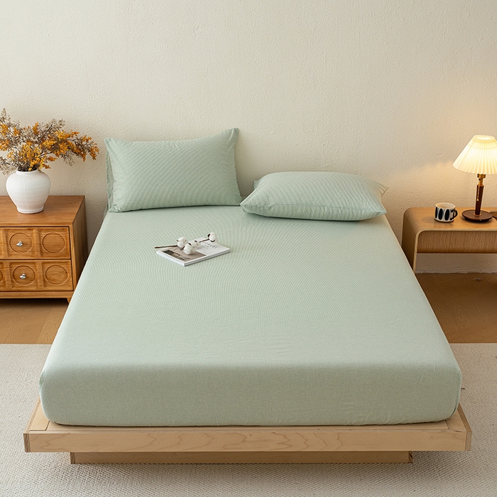 91家纺网 家纺一手货源 找家纺 吉象家纺 2025新款全棉色织水洗棉床笠三件套 秘境绿条