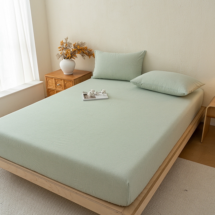 91家纺网 家纺一手货源 找家纺 吉象家纺 2025新款全棉色织水洗棉床笠三件套 秘境绿条