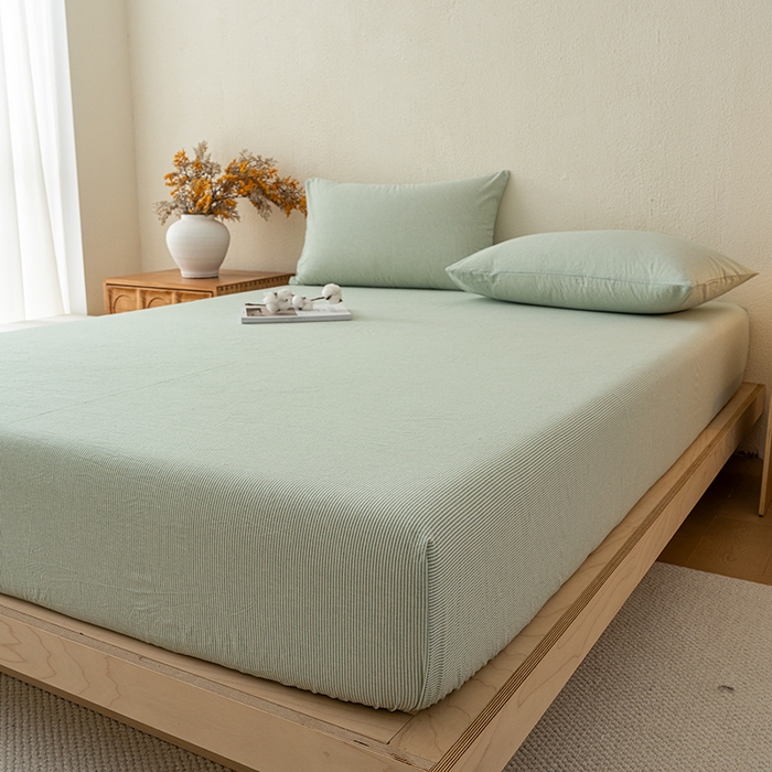 91家纺网 家纺一手货源 找家纺 吉象家纺 2025新款全棉色织水洗棉床笠三件套 秘境绿条