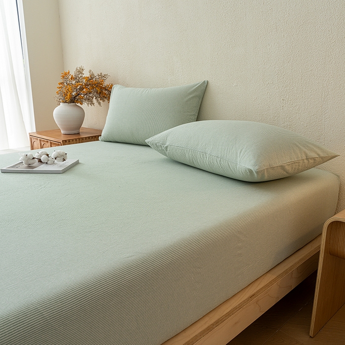 91家纺网 家纺一手货源 找家纺 吉象家纺 2025新款全棉色织水洗棉床笠三件套 秘境绿条