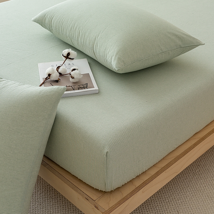 91家纺网 家纺一手货源 找家纺 吉象家纺 2025新款全棉色织水洗棉床笠三件套 秘境绿条