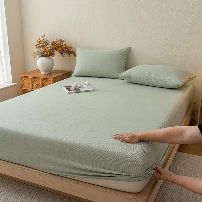 91家纺网 家纺一手货源 找家纺 吉象家纺 2025新款全棉色织水洗棉床笠三件套 秘境绿条