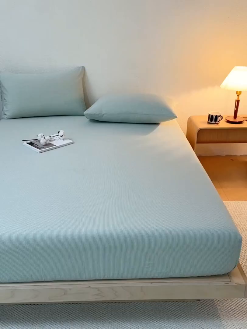 91家纺网 家纺一手货源 找家纺 吉象家纺 2025新款全棉色织水洗棉床笠三件套 秘境绿条