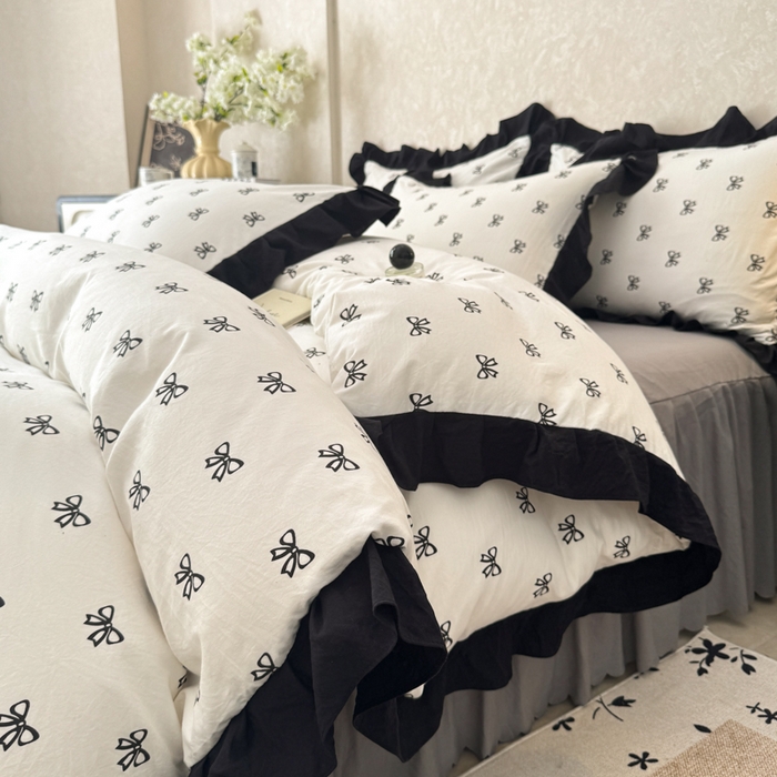 91家纺网 家纺一手货源 找家纺 上尚居 2025新款法式花边赫本风印花云朵棉四件套 黑色蝴蝶结