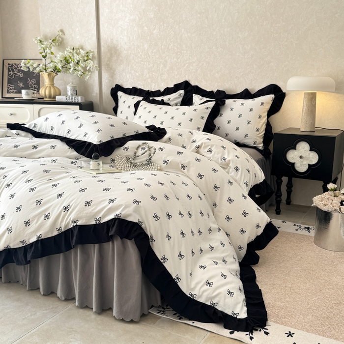 91家纺网 家纺一手货源 找家纺 上尚居 2025新款法式花边赫本风印花云朵棉四件套 黑色蝴蝶结