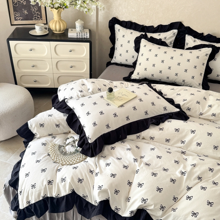 91家纺网 家纺一手货源 找家纺 上尚居 2025新款法式花边赫本风印花云朵棉四件套 黑色蝴蝶结