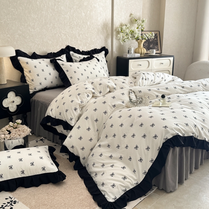 91家纺网 家纺一手货源 找家纺 上尚居 2025新款法式花边赫本风印花云朵棉四件套 黑色蝴蝶结