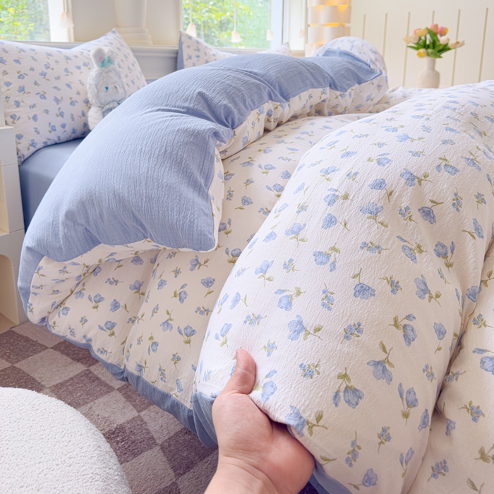 91家纺网 家纺一手货源 找家纺 蓝淋家纺 2025新款亲肤舒适皱皱棉印花四件套 浪漫定义-蓝