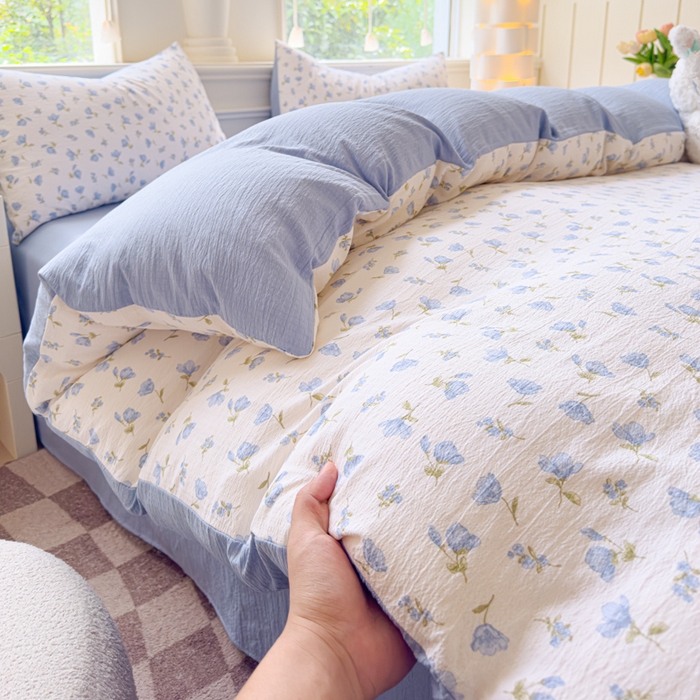 91家纺网 家纺一手货源 找家纺 蓝淋家纺 2025新款亲肤舒适皱皱棉印花四件套 浪漫定义-蓝