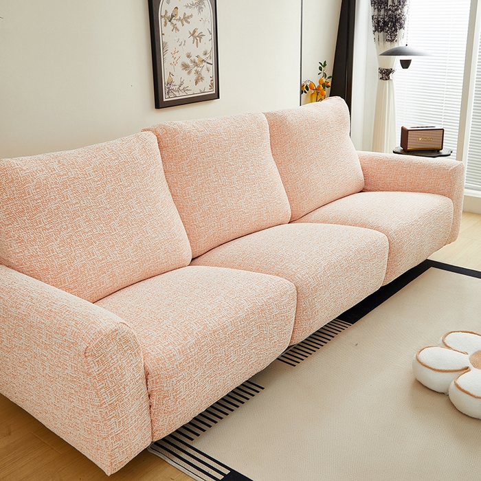 91家纺网 家纺一手货源 找家纺 丝绮鹿 2025新款竹节雪尼尔芝华士沙发套 奶油橘