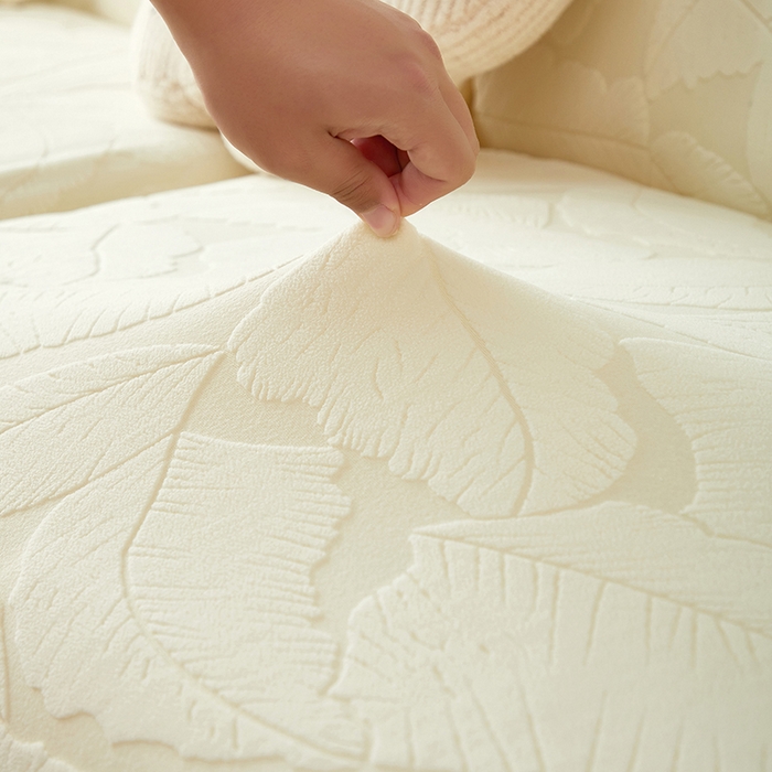 91家纺网 家纺一手货源 找家纺 丝绮鹿 2025新款富贵叶系列-沙发套松紧款（组合沙发图） 米白