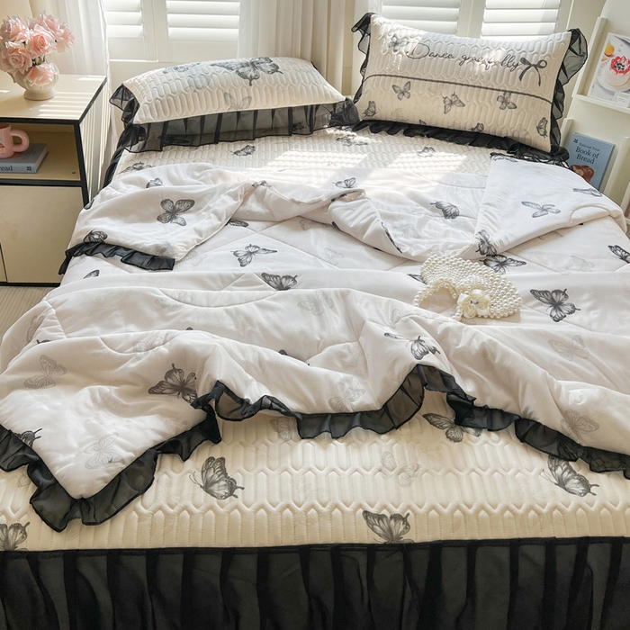 91家纺网 家纺一手货源 找家纺 沐慕 2025新款床裙款凉感丝凉席夏被四件套 床裙-黑蝴蝶