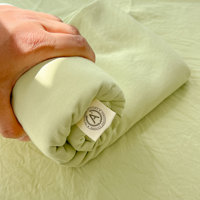 91家纺网 家纺一手货源 找家纺 温眠家纺 2025新款A类水洗棉色织单床单系列-单枕套 豆绿