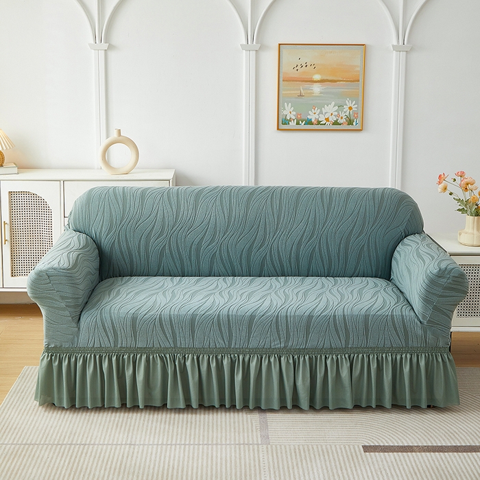 91家纺网 家纺一手货源 找家纺 共鸣沙发套 2025春夏新款水波纹裙摆弹力提花全包万能沙发套单沙发套裙摆款 墨绿色