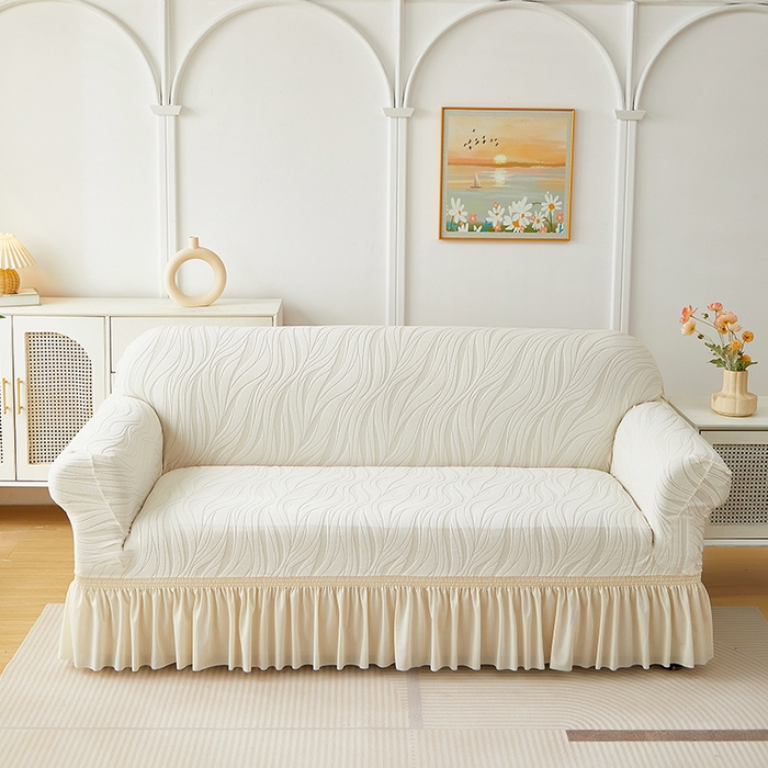 91家纺网 家纺一手货源 找家纺 共鸣沙发套 2025春夏新款水波纹裙摆弹力提花全包万能沙发套单沙发套裙摆款 象牙白