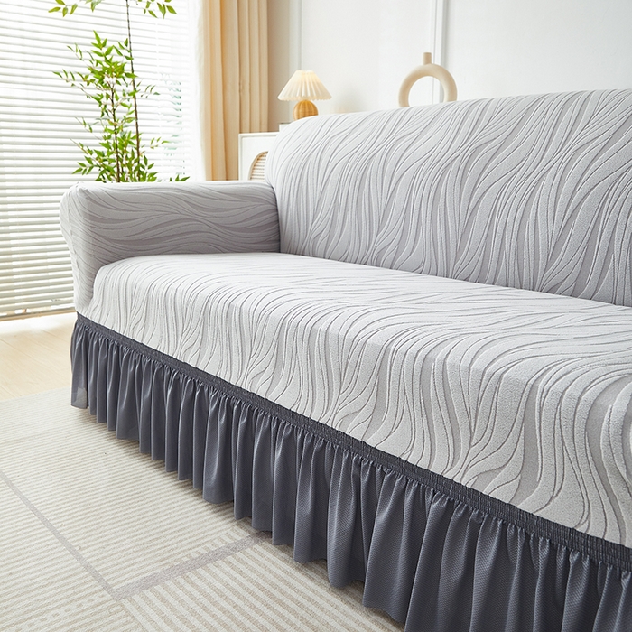 91家纺网 家纺一手货源 找家纺 共鸣沙发套 2025春夏新款水波纹裙摆弹力提花全包万能沙发套单沙发套裙摆款 浅灰色