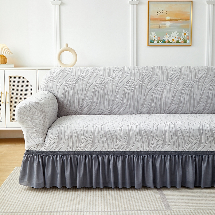 91家纺网 家纺一手货源 找家纺 共鸣沙发套 2025春夏新款水波纹裙摆弹力提花全包万能沙发套单沙发套裙摆款 浅灰色