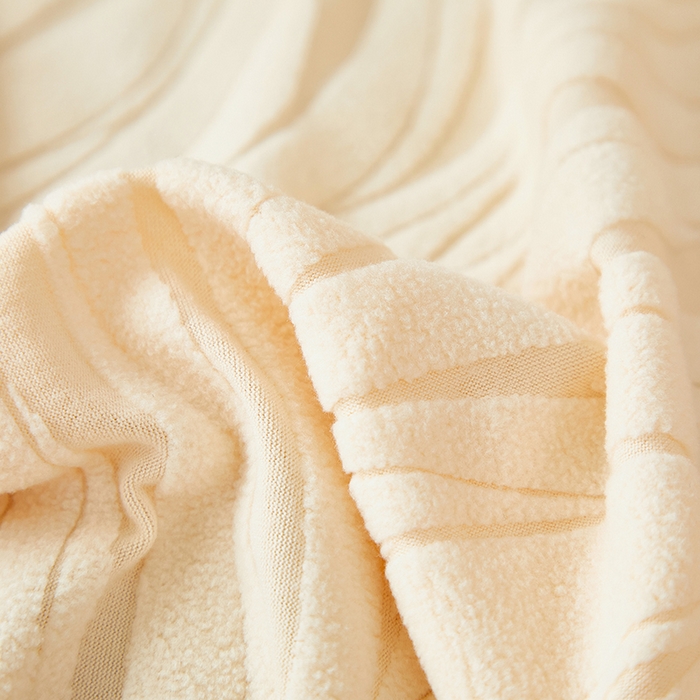 91家纺网 家纺一手货源 找家纺 共鸣沙发套 2025春夏新款水波纹弹力提花全包万能沙发套单沙发套全包款 米黄色