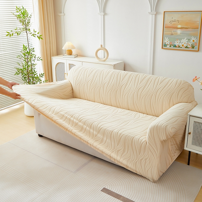 91家纺网 家纺一手货源 找家纺 共鸣沙发套 2025春夏新款水波纹弹力提花全包万能沙发套单沙发套全包款 米黄色