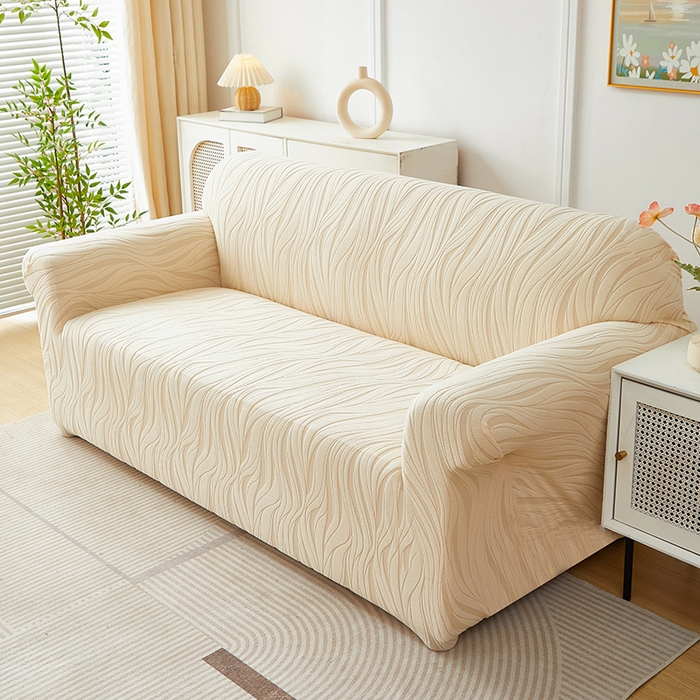 91家纺网 家纺一手货源 找家纺 共鸣沙发套 2025春夏新款水波纹弹力提花全包万能沙发套单沙发套全包款 米黄色