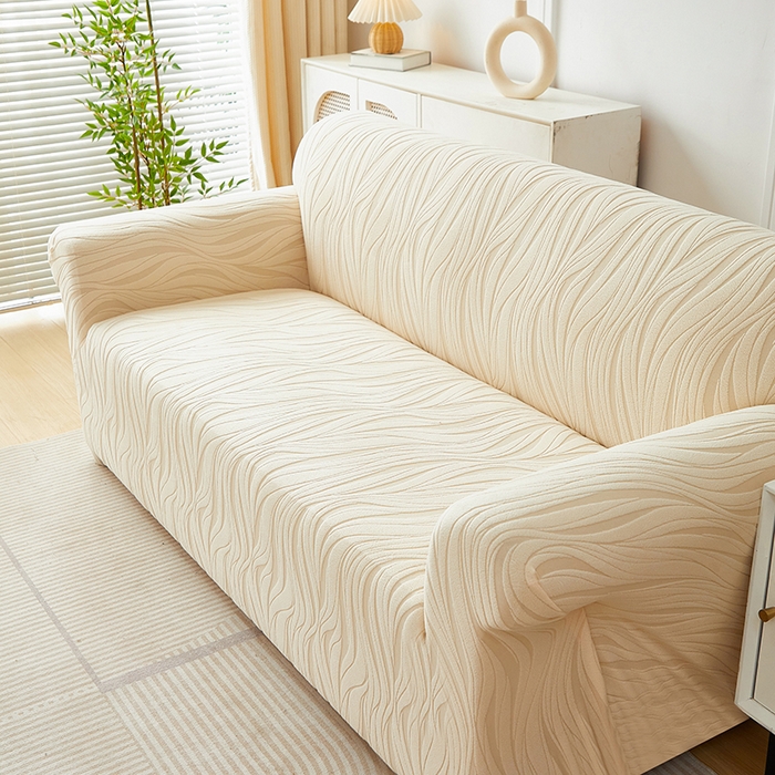 91家纺网 家纺一手货源 找家纺 共鸣沙发套 2025春夏新款水波纹弹力提花全包万能沙发套单沙发套全包款 米黄色