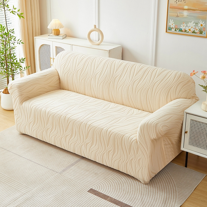 91家纺网 家纺一手货源 找家纺 共鸣沙发套 2025春夏新款水波纹弹力提花全包万能沙发套单沙发套全包款 米黄色