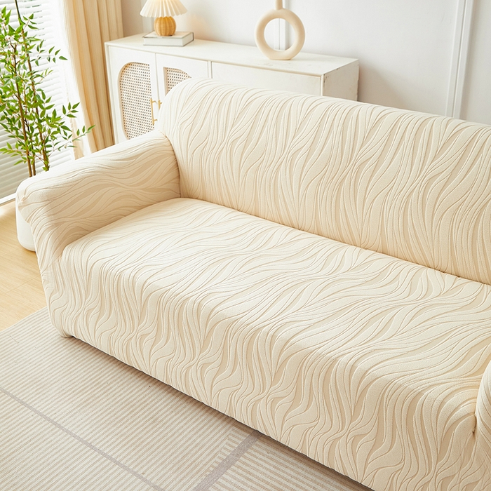 91家纺网 家纺一手货源 找家纺 共鸣沙发套 2025春夏新款水波纹弹力提花全包万能沙发套单沙发套全包款 米黄色