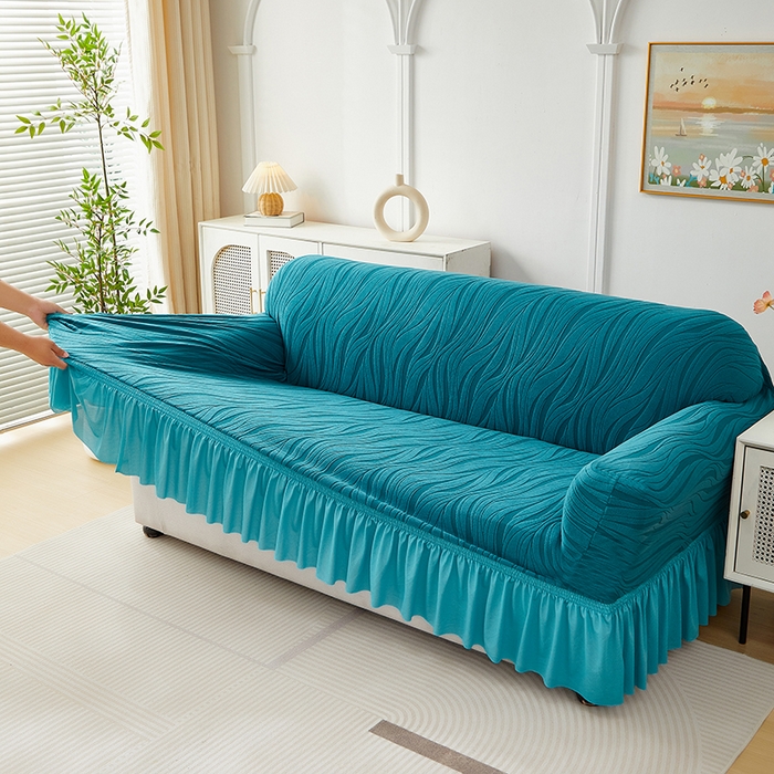 91家纺网 家纺一手货源 找家纺 共鸣沙发套 2025春夏新款水波纹裙摆弹力提花全包万能沙发套单沙发套裙摆款 橄榄绿