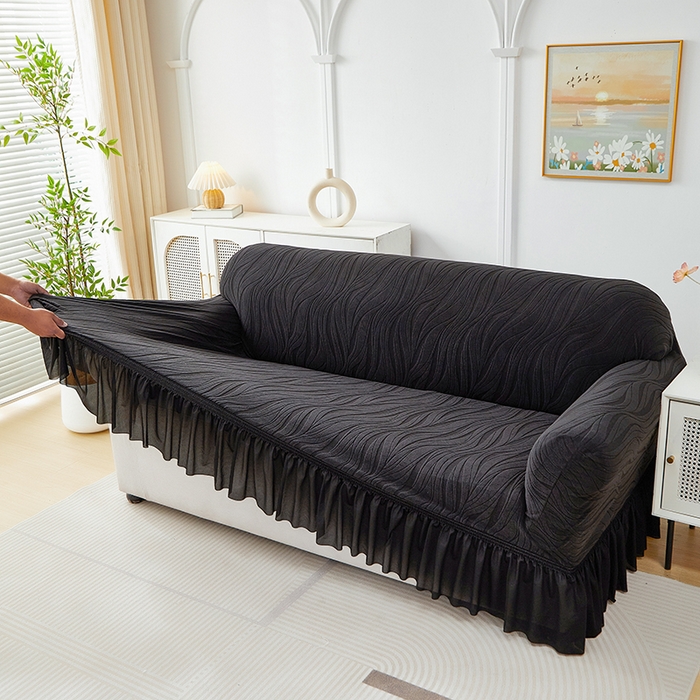 91家纺网 家纺一手货源 找家纺 共鸣沙发套 2025春夏新款水波纹裙摆弹力提花全包万能沙发套单沙发套裙摆款 黑色