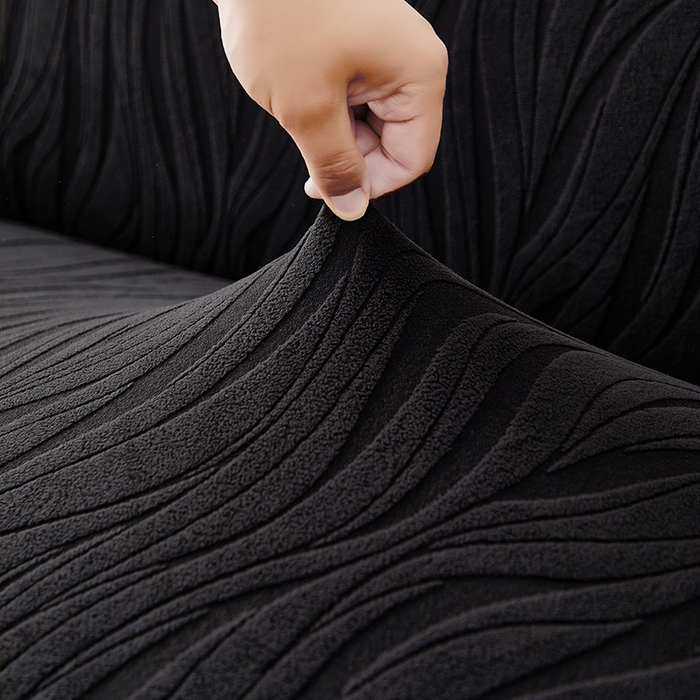 91家纺网 家纺一手货源 找家纺 共鸣沙发套 2025春夏新款水波纹裙摆弹力提花全包万能沙发套单沙发套裙摆款 黑色