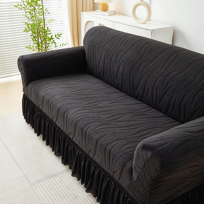 91家纺网 家纺一手货源 找家纺 共鸣沙发套 2025春夏新款水波纹裙摆弹力提花全包万能沙发套单沙发套裙摆款 黑色