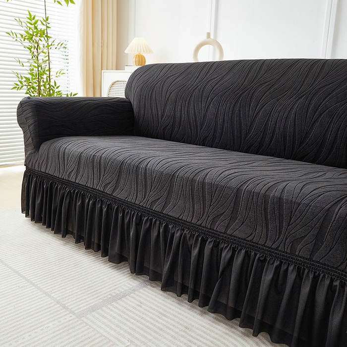 91家纺网 家纺一手货源 找家纺 共鸣沙发套 2025春夏新款水波纹裙摆弹力提花全包万能沙发套单沙发套裙摆款 黑色